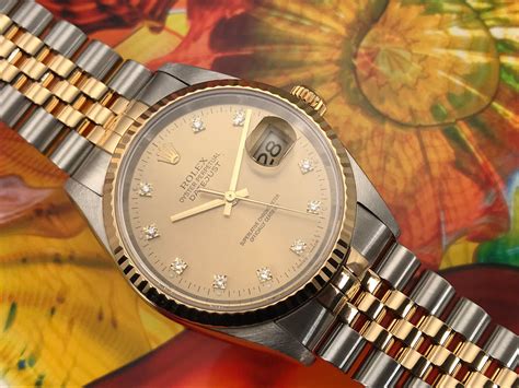 rolex day date oyster perpetual gold roman numerals 1987